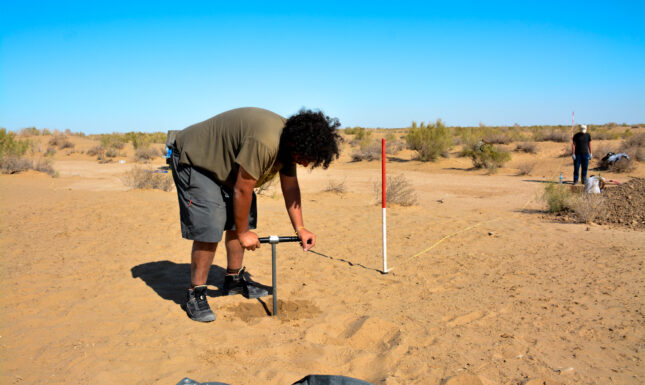 Arciero working in the desert